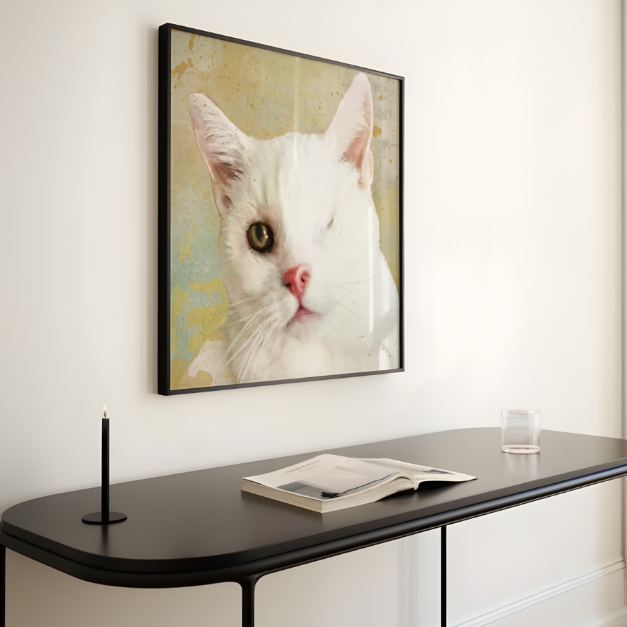 A framed portrait of a white cat with one eye on a sleek black console.